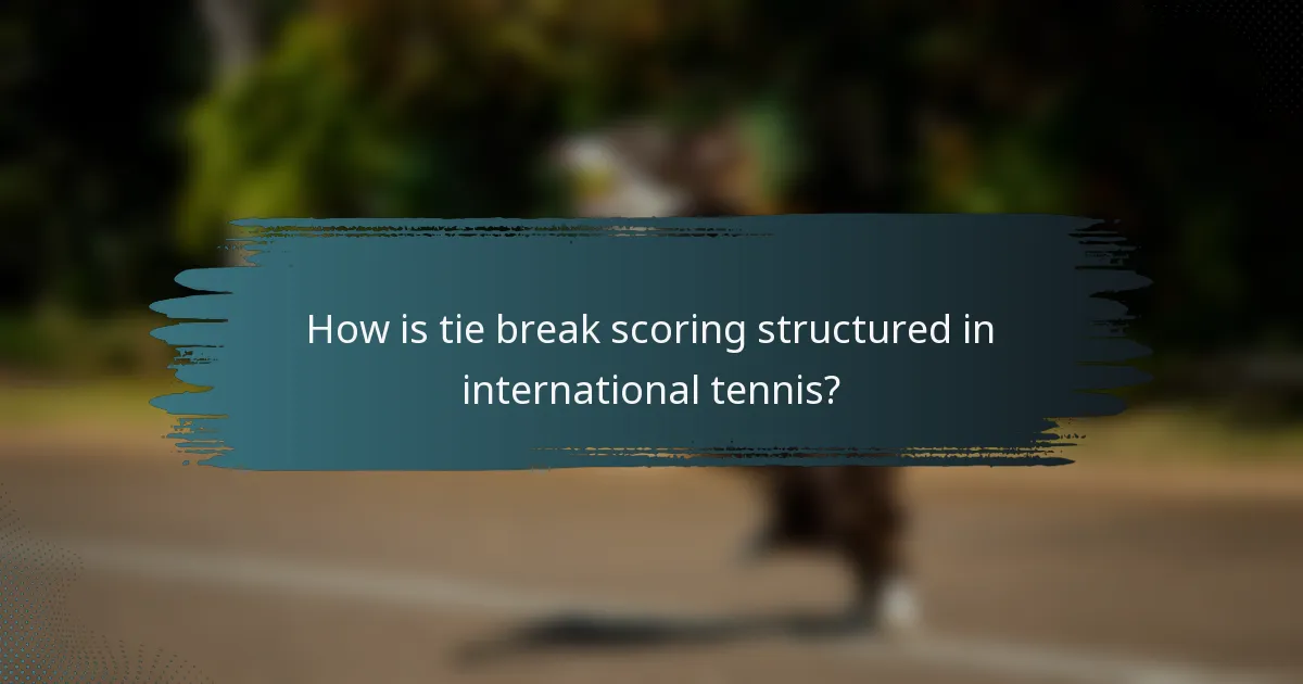 How is tie break scoring structured in international tennis?